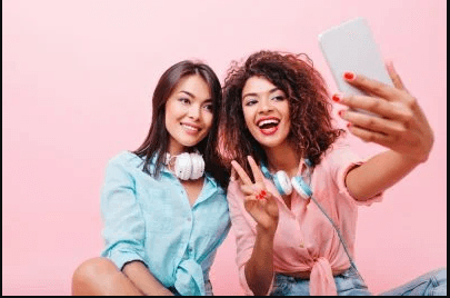 two young ladies taking a selfie