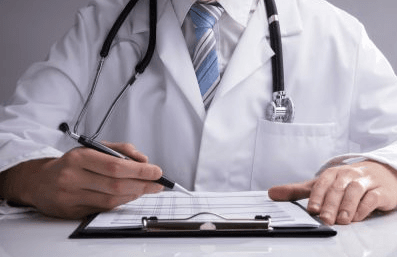 Doctor looking over notes