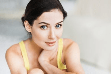 young woman in yellow shirt